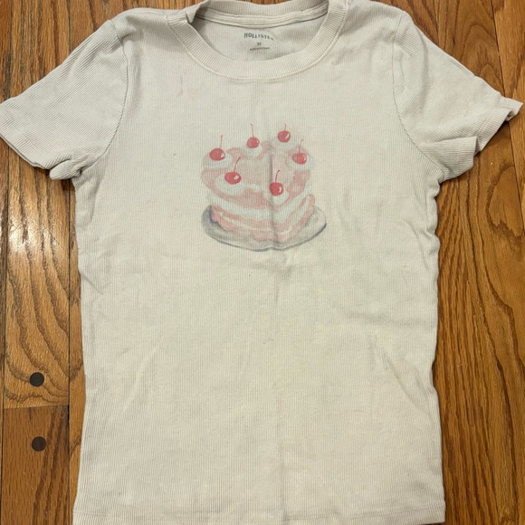 Hollister Tops - Hollister White Tee with Pink Cake Design